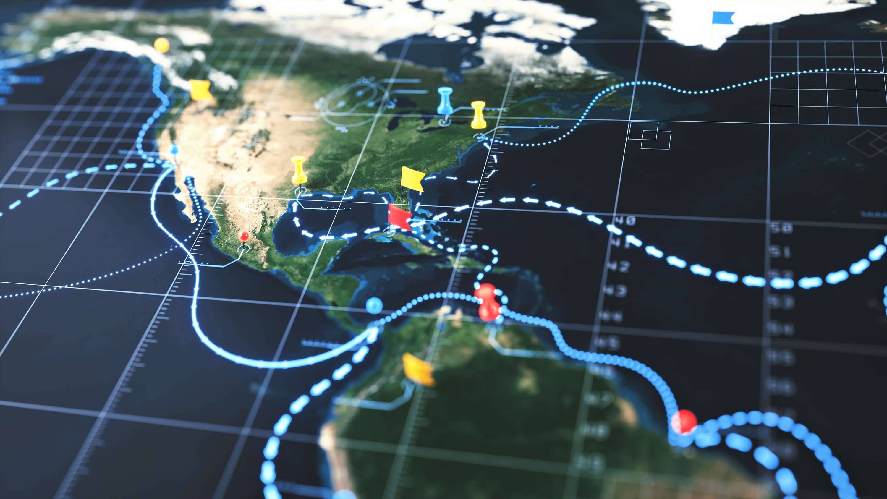 A closeup of a North American map with places pinned.