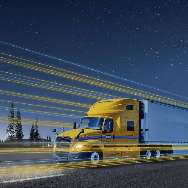 A digitally manipulated photo of a yellow and white Penske semi-truck at night.