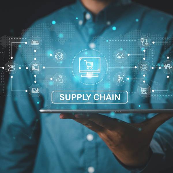 A graphic of a businessman holding a supply chain graphic.