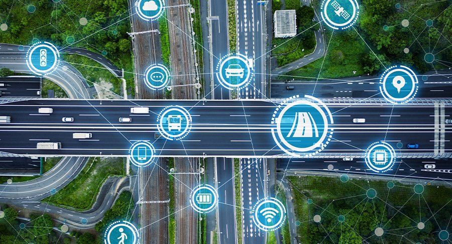 A graphic showing roads and transportation icons from above.