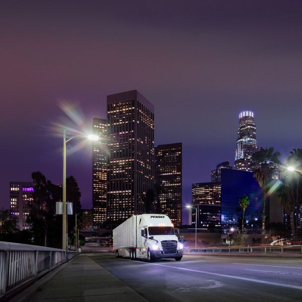 A Penske Leasing truck on the road improving uptime.