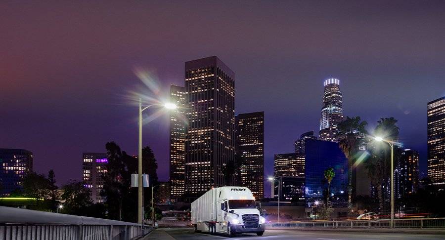 A Penske Leasing truck on the road improving uptime.
