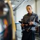 Maintenance Employee with Device