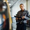 Maintenance Employee with Device