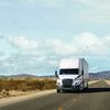 Tractor and trailer on road