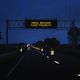 highway sign promoting safe driving