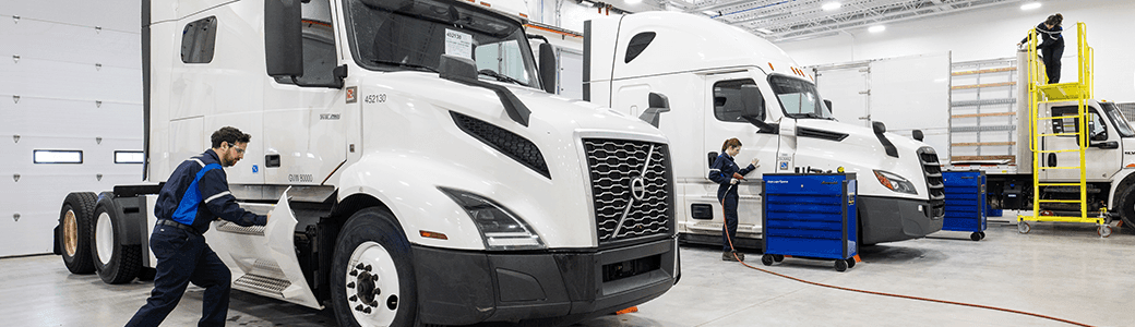 Penske technicians working