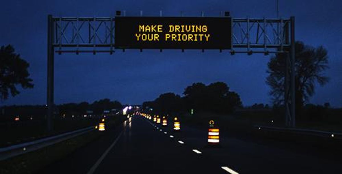 highway sign promoting safe driving