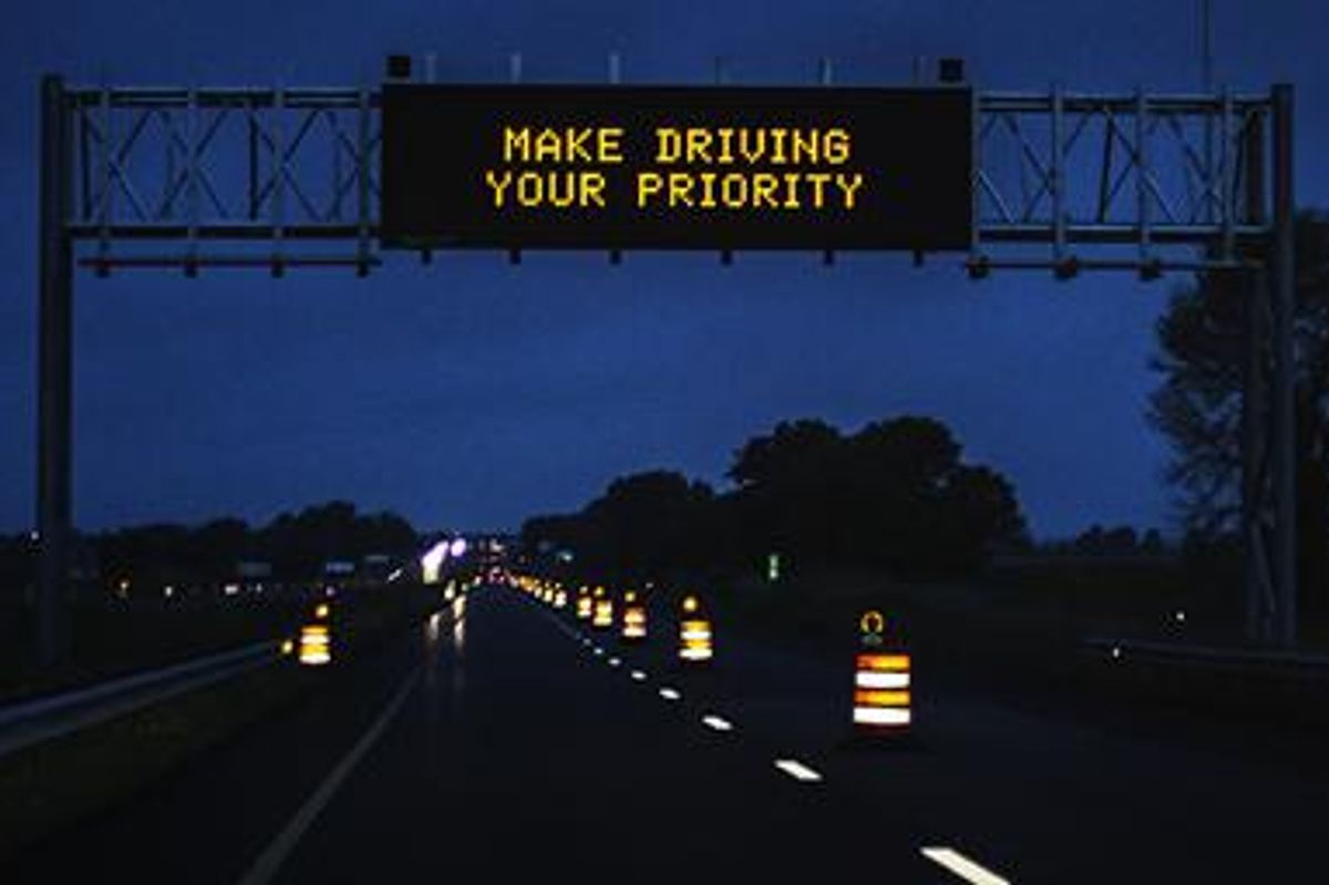 highway sign promoting safe driving