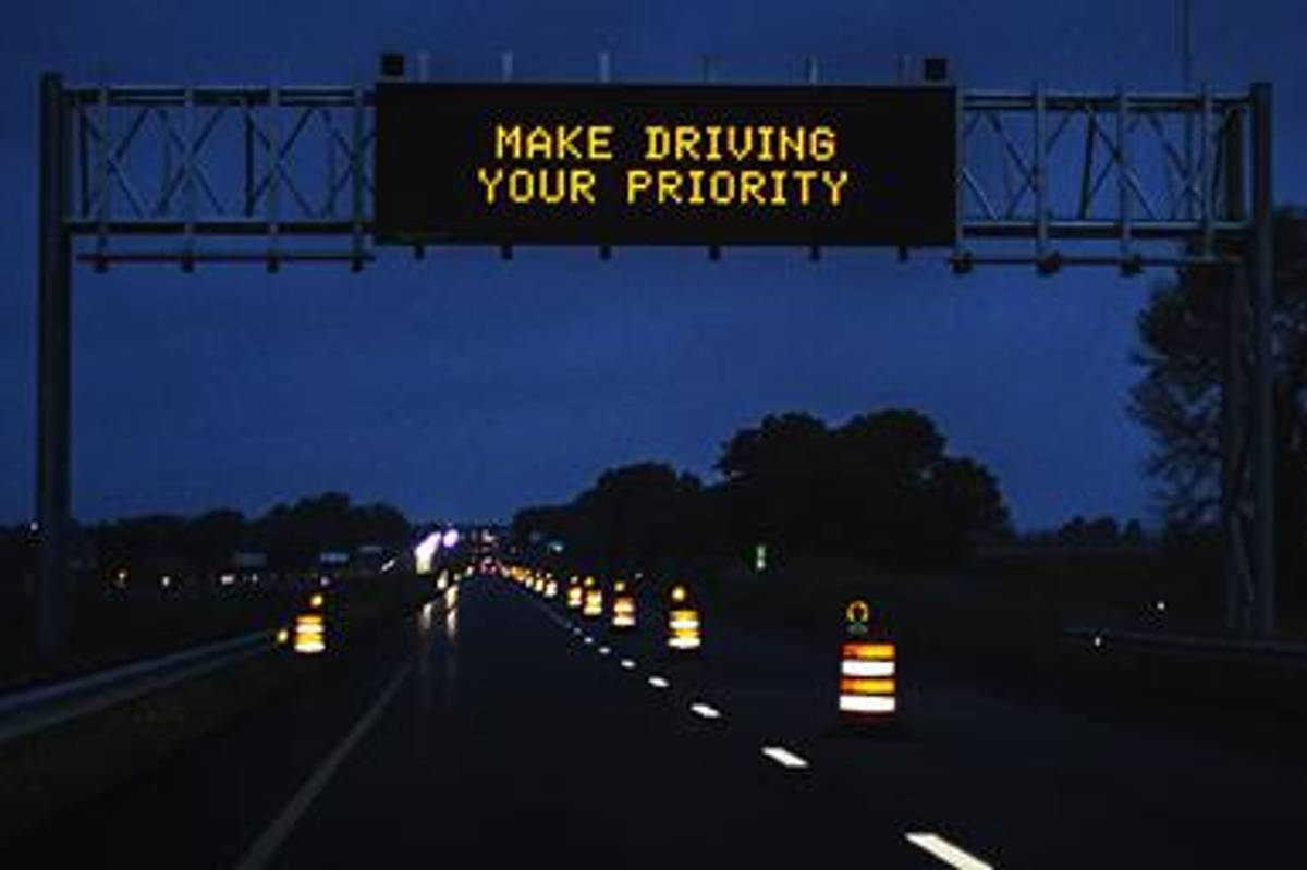 highway sign promoting safe driving