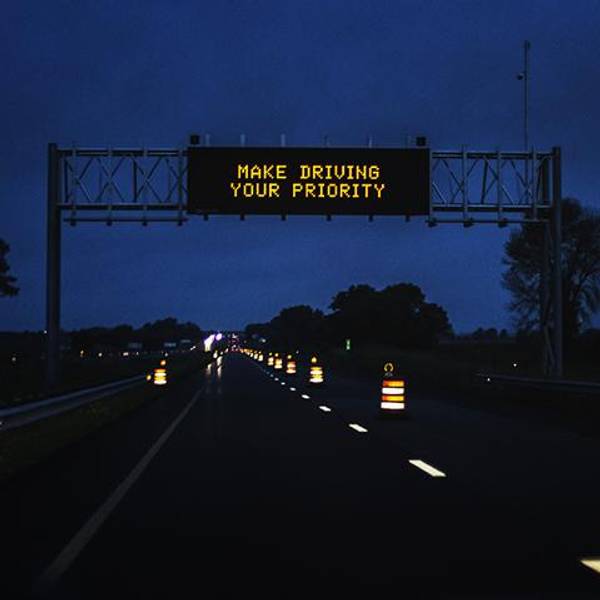 highway sign promoting safe driving