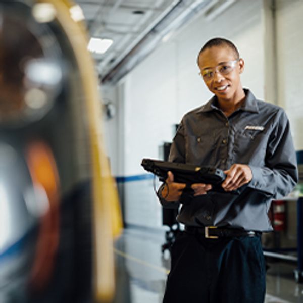 Maintenance Employee with Device