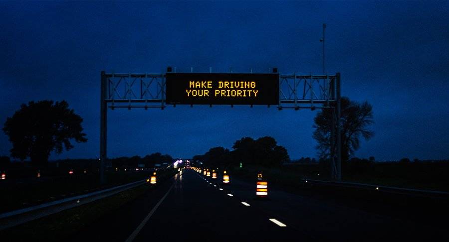 Make Driving a Priority highway sign