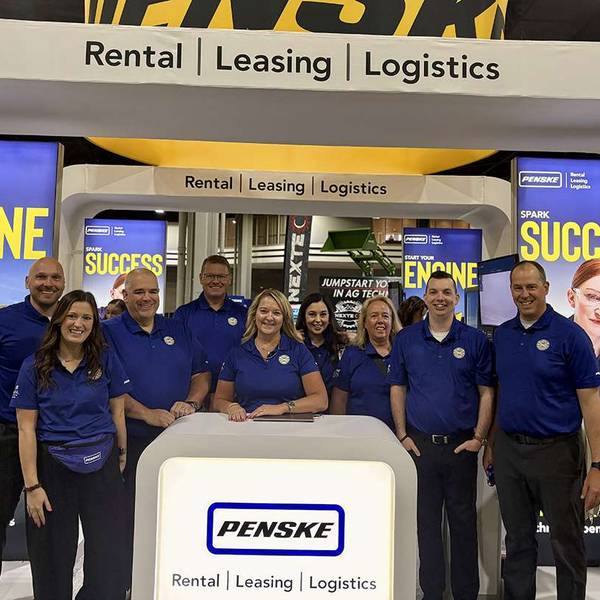 Penske associates standing at SkillSUSA booth