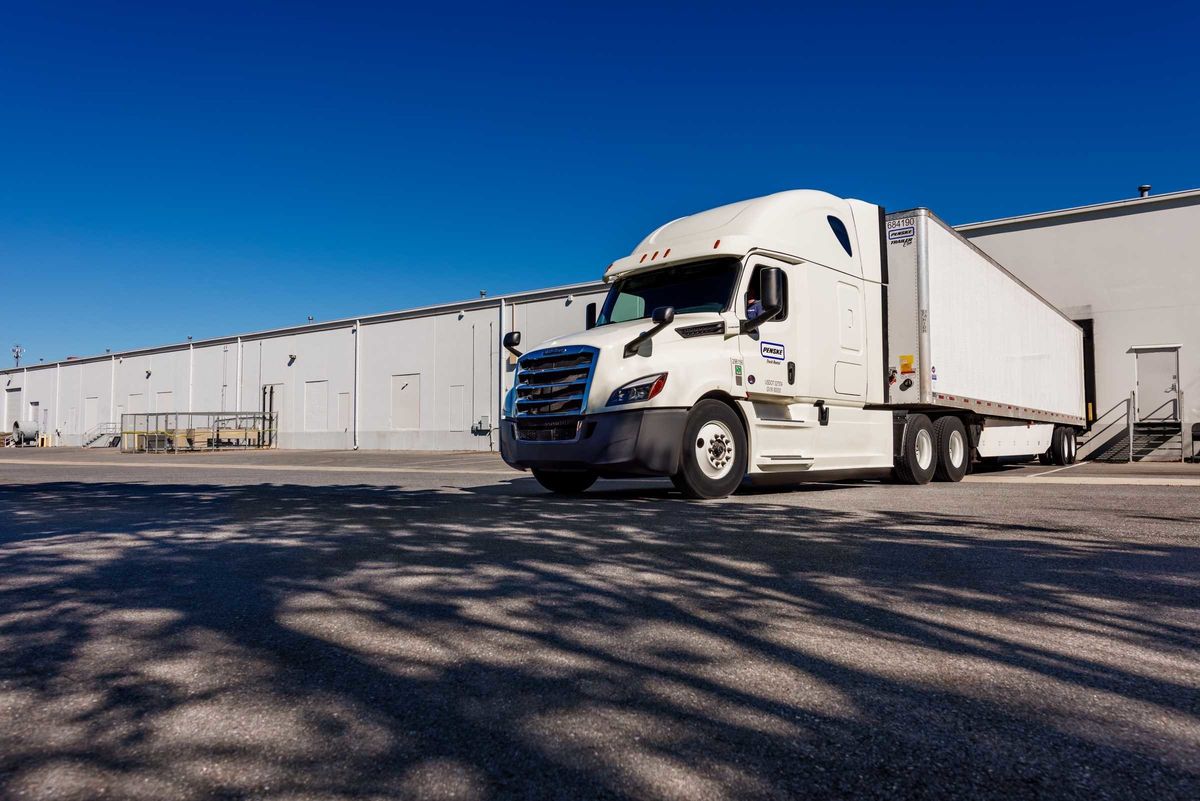 Penske tractor and trailer at warehouse