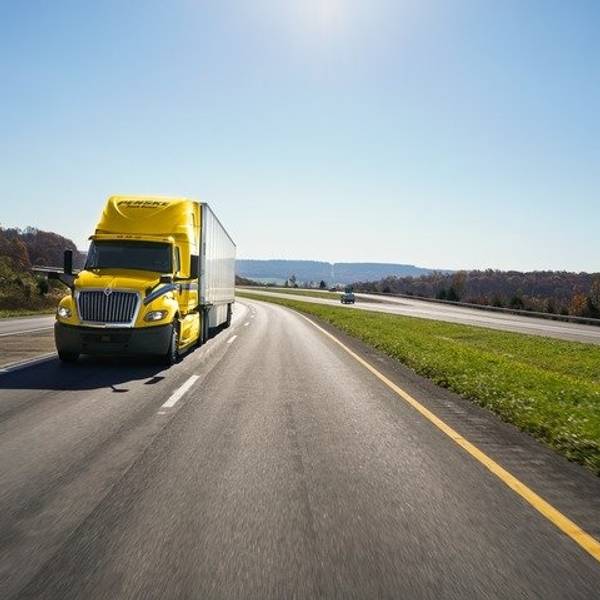 Penske tractor and trailer on highway
