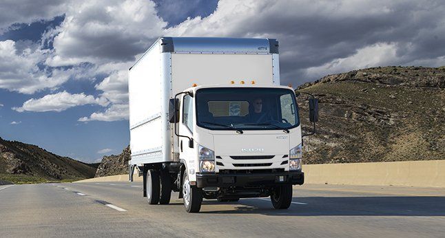 Penske tractor trailer at a loading dock