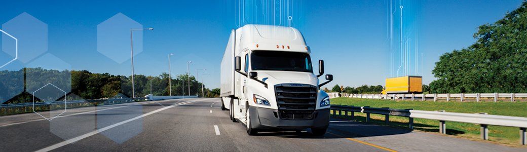 Penske tractor trailer on a divided highway