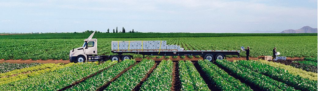 penske truck in farm field
