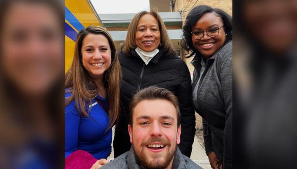 Penske Truck Leasing associates gather to distribute school supplies.