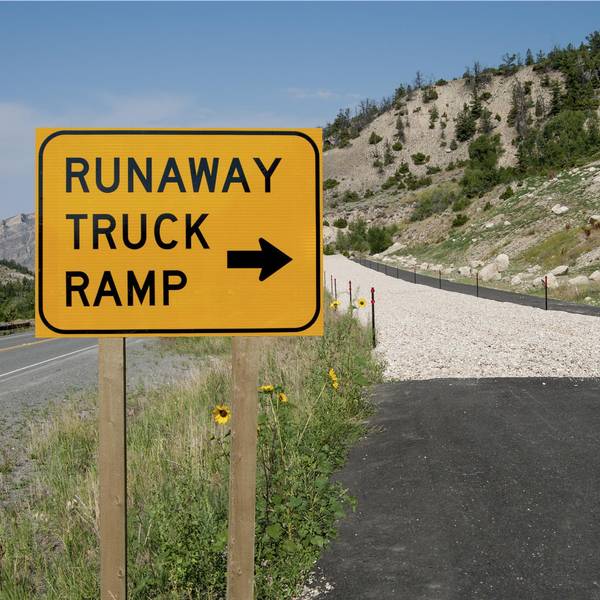 Runaway truck ramp sign and ramp