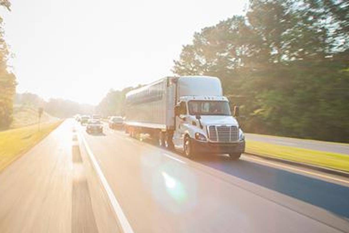Truck on the highway in the heat