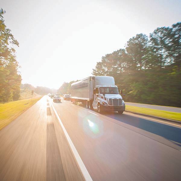 Truck on the highway in the heat