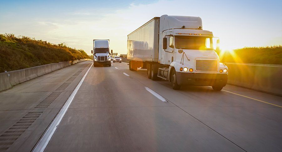 Trucks driving on the road ready for CVSA Roadcheck 2023.
