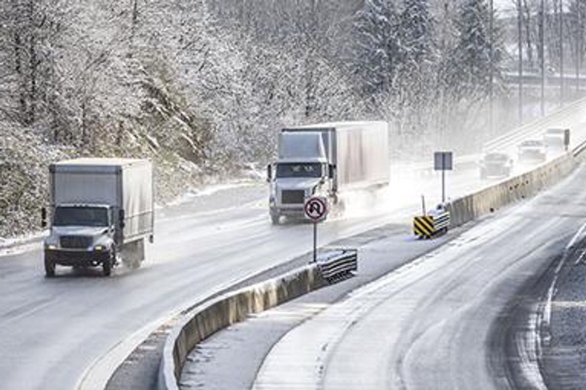 trucks driving on winter roads