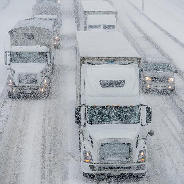 Vehicles driving in winter conditions