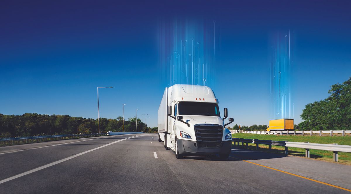 White truck driving down the highway
