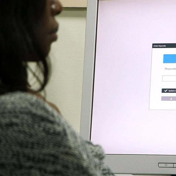 Woman using testing software